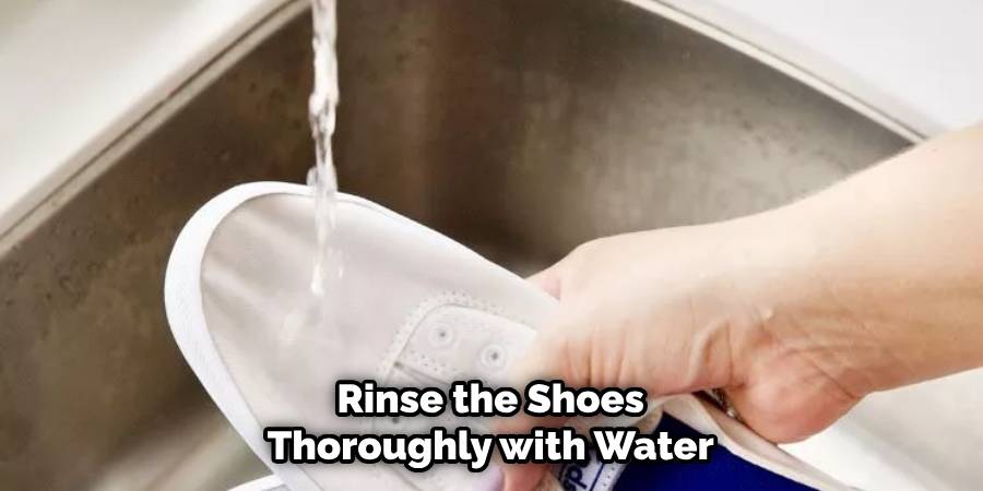 Rinse the Shoes Thoroughly with Water